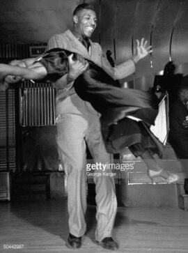 1938 afroamericanos bailando en el Savoy